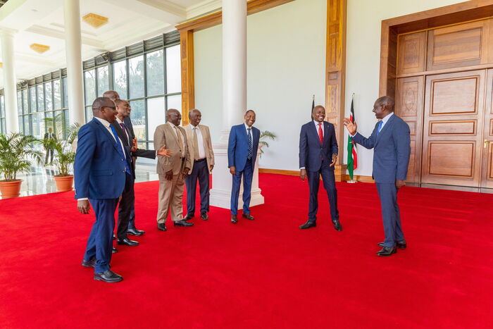 President William Ruto(right) shares a light moment with lawmakers from Nyeri at State House Nairobi on September 18, 2024. PCS