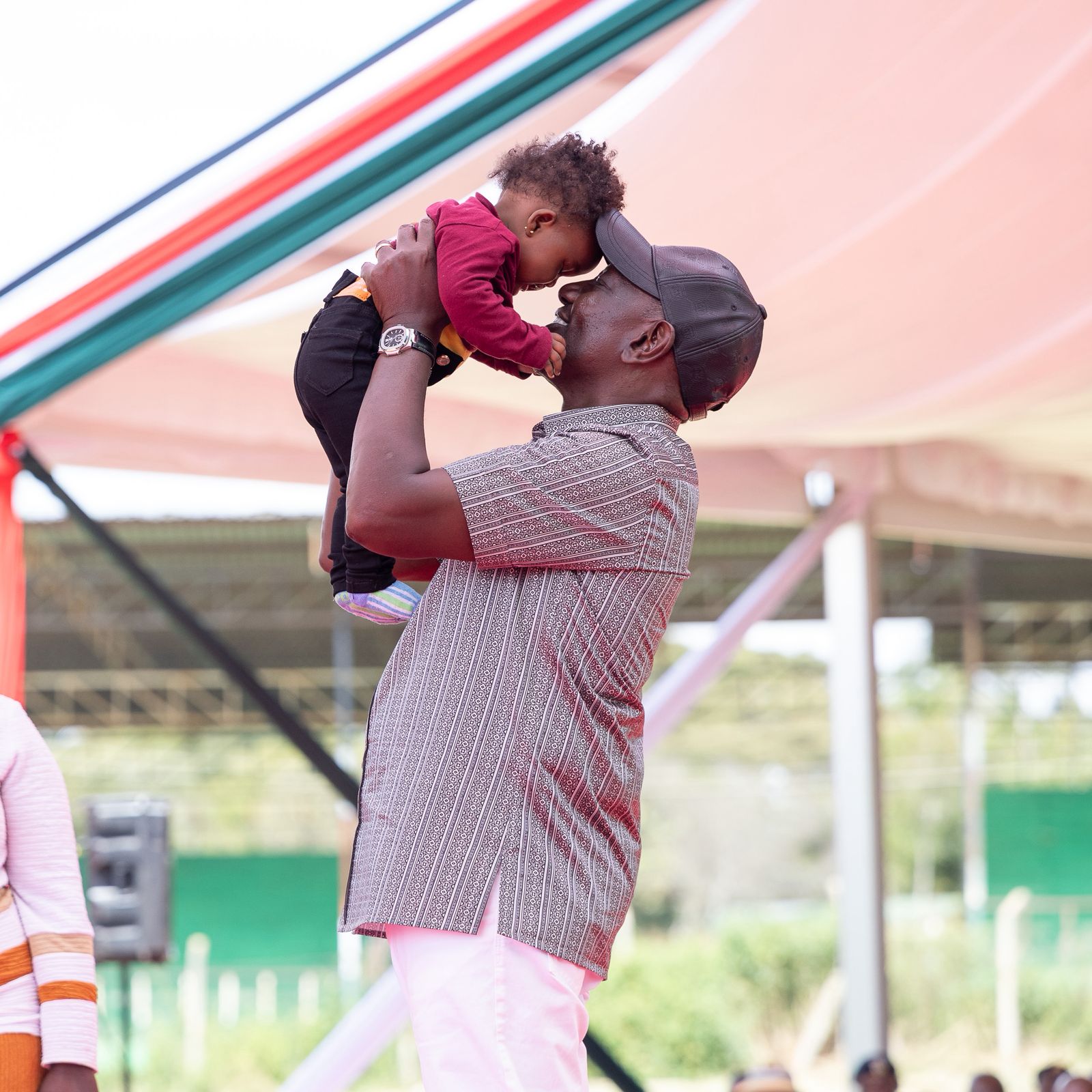 Young Girl Clings to President Ruto, Laughs and Confusion Erupt at NYOTA Launch
